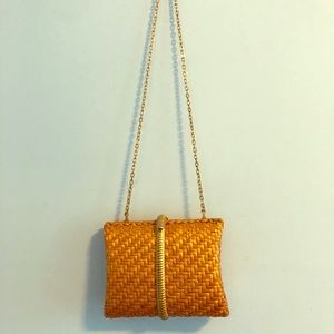 Rodo hand bag with gold chain, wicker clutch